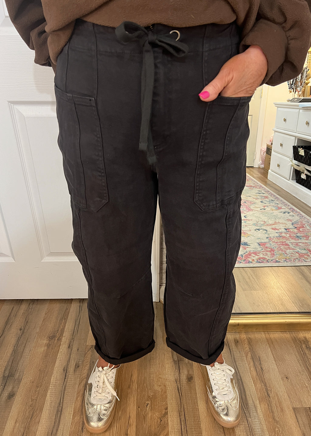 Model wearing Risen Cargo Barrel Jeans styled with sneakers