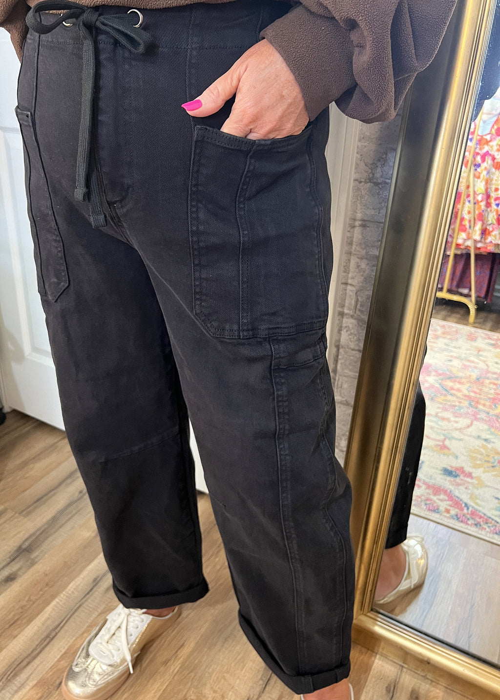 Side profile of Risen Cargo Barrel Jeans highlighting curved barrel-leg shape