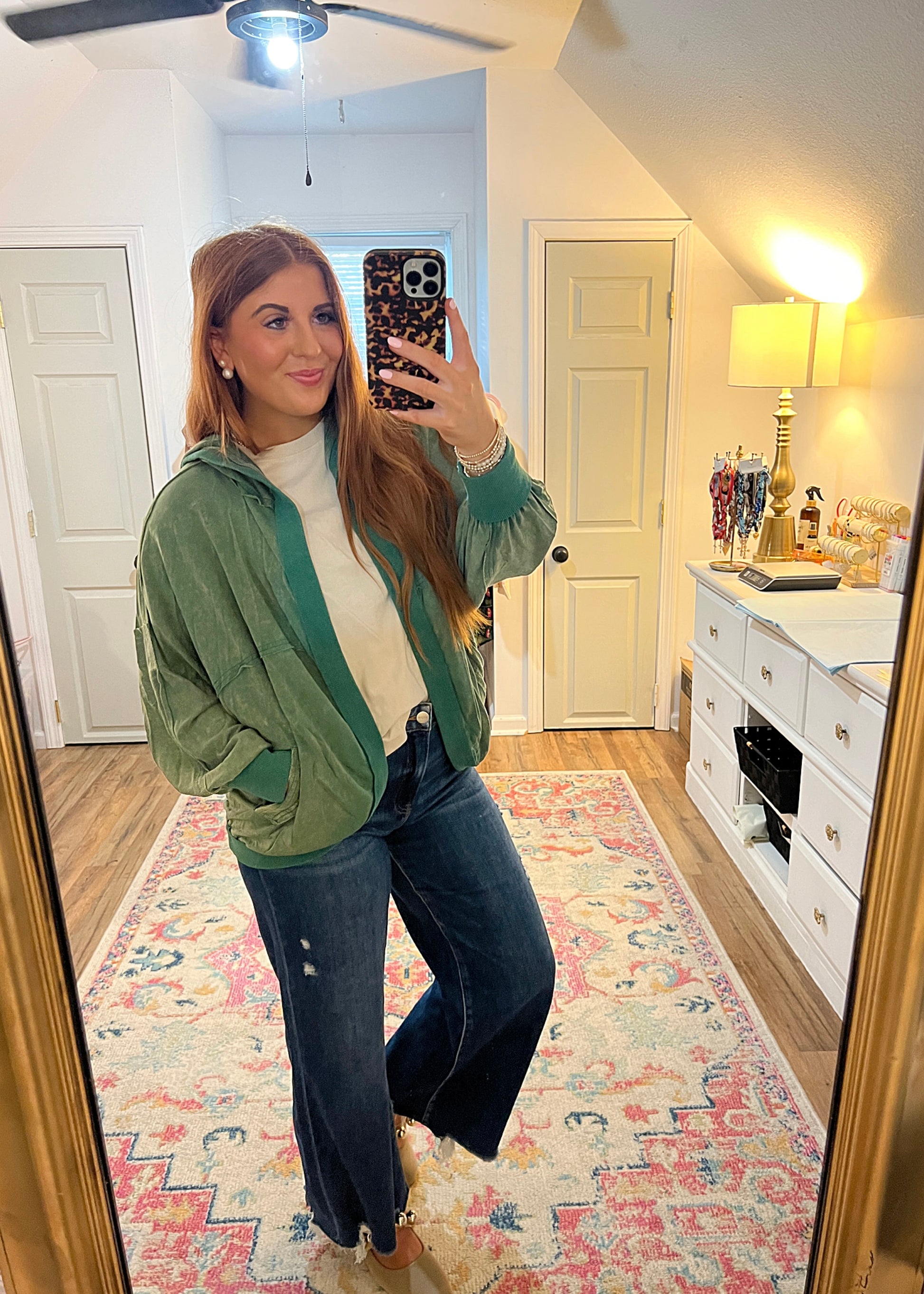 Green hooded jacket with pockets and an oversized fit 