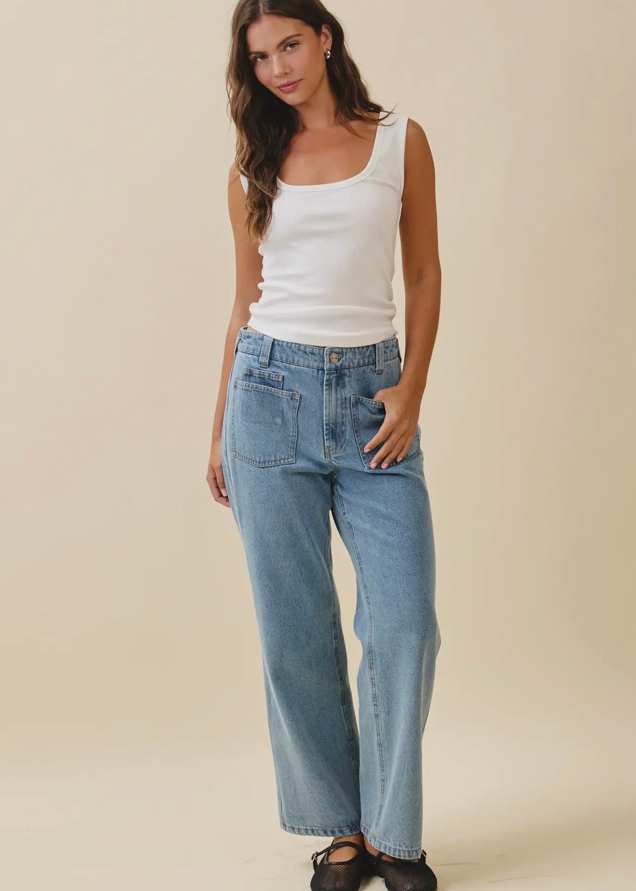 Patch pocket jeans styled with a casual top