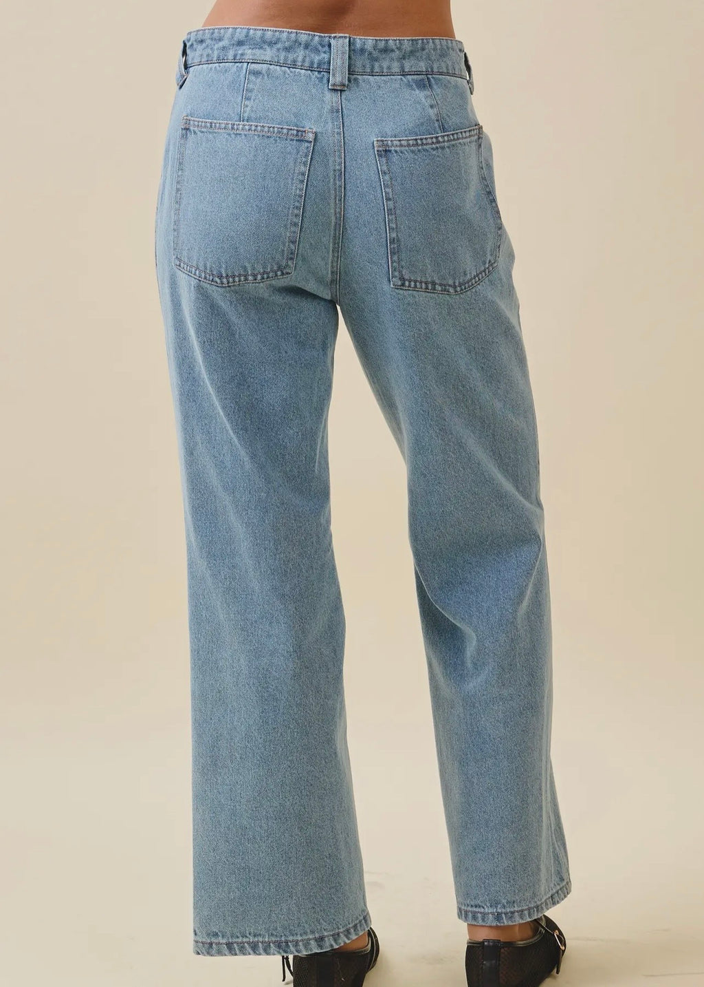 Back view of women’s patch pocket jeans