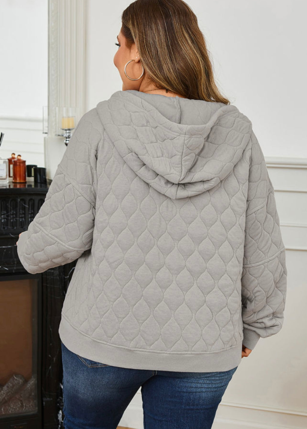 Women’s grey quilted quarter zip pullover with hood
