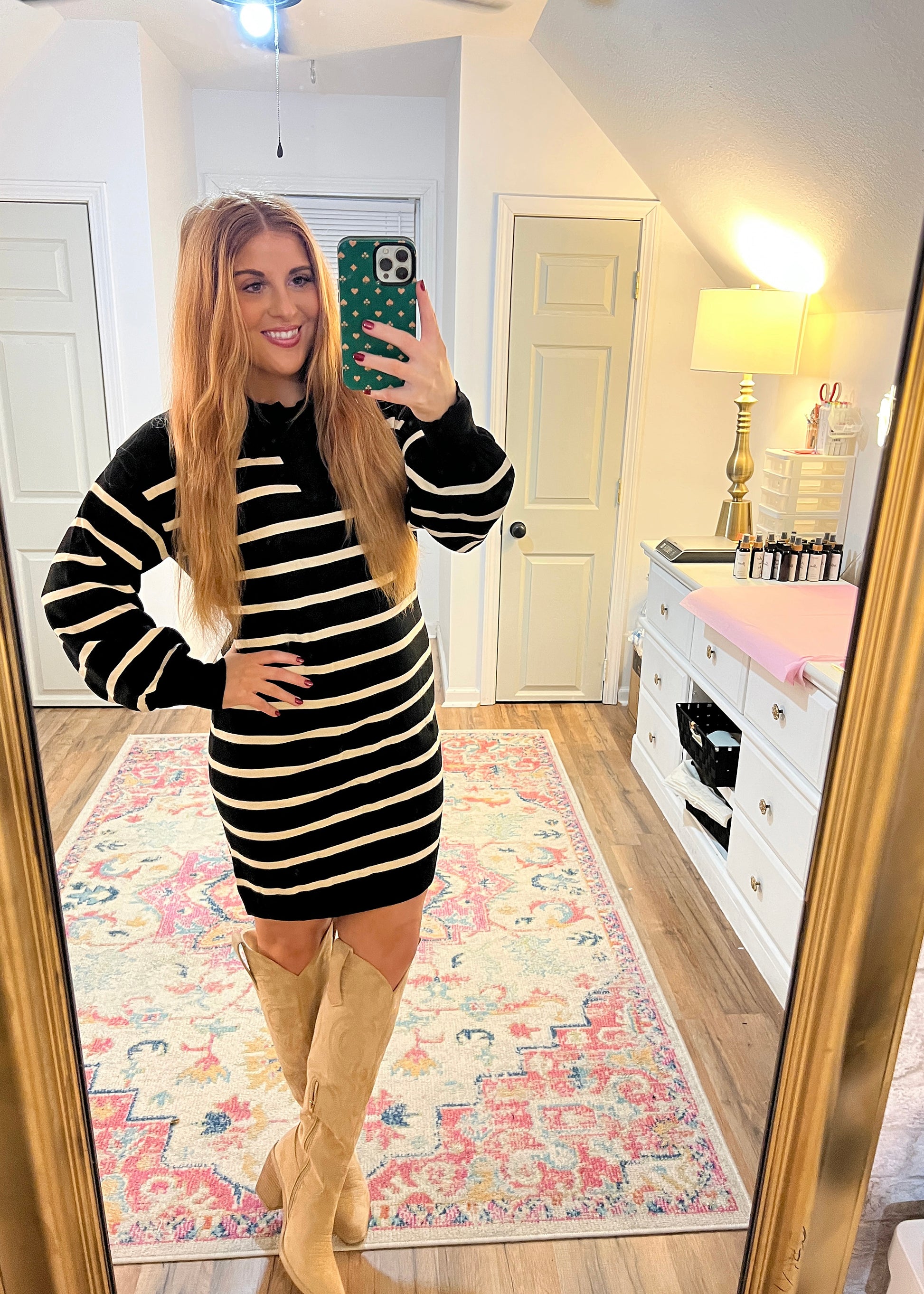 Women’s black striped long sleeve sweater dress in soft knit fabric