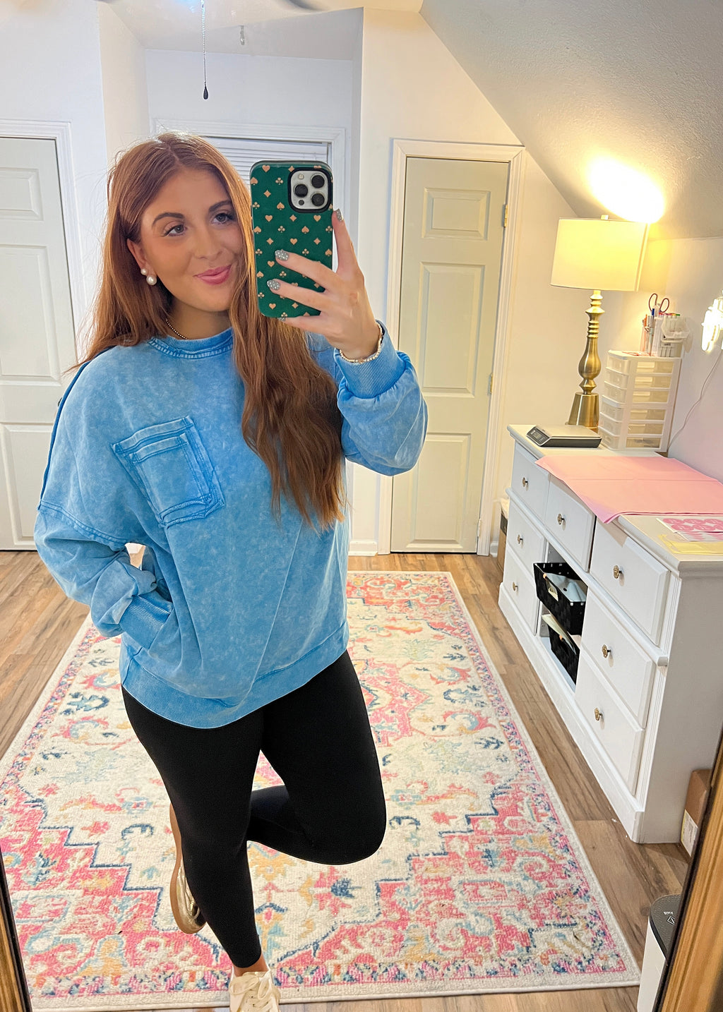 Blueberry-colored pullover top with long sleeves