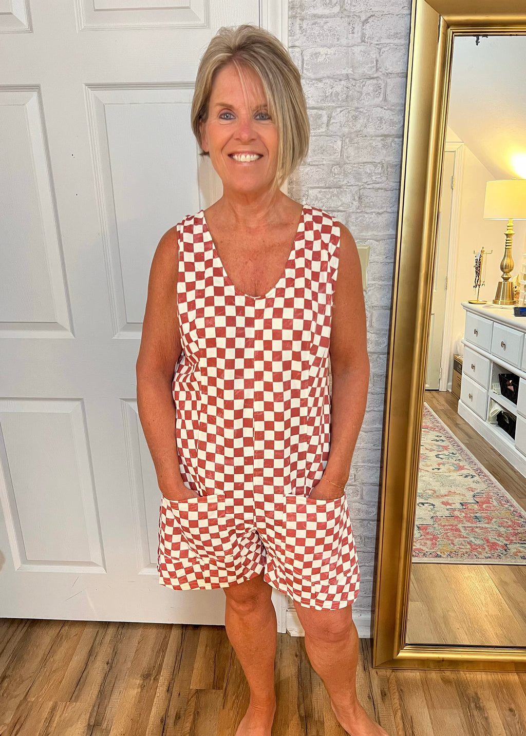 Woman wearing the Boardwalk Babe Romper – lightweight summer romper