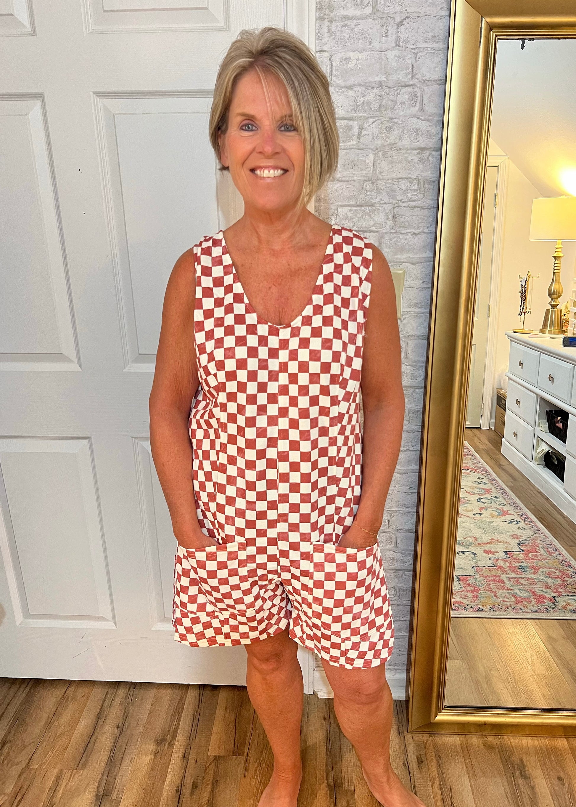 Woman wearing the Boardwalk Babe Romper – lightweight summer romper