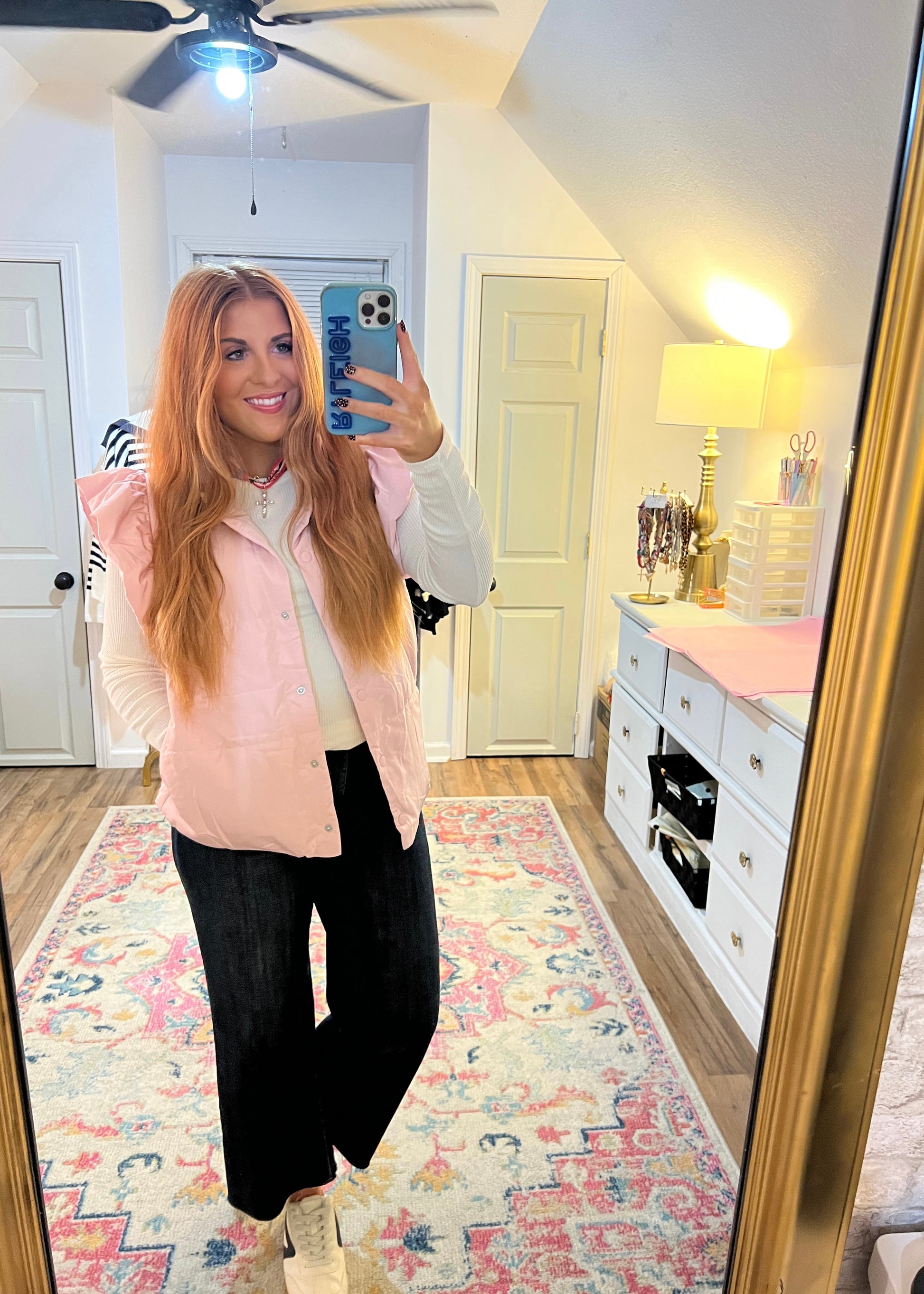 Chic in Pink vest featuring a lightweight puffer design in a baby pink, ruffled sleeve