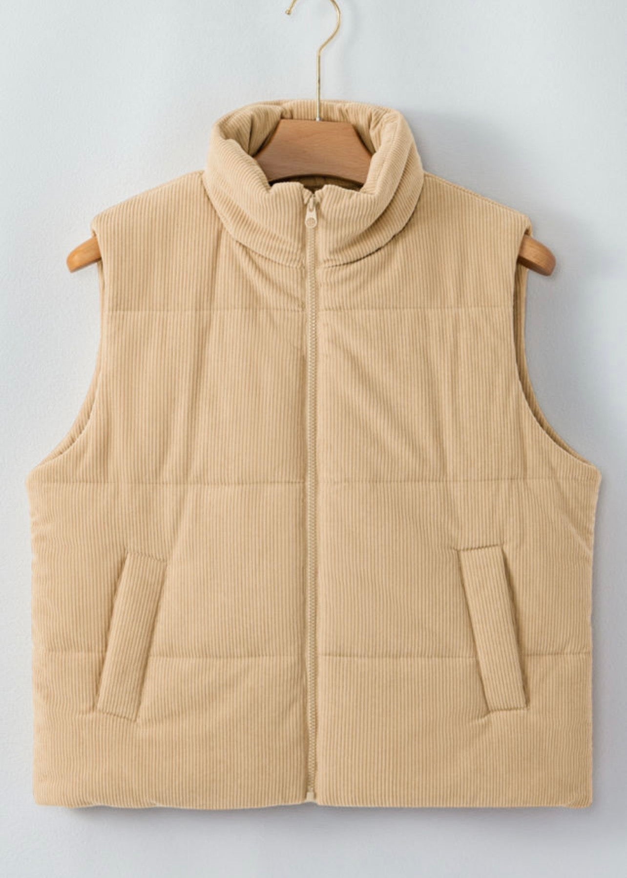 Women’s beige corduroy vest with soft textured fabric and zipper detail, plus size