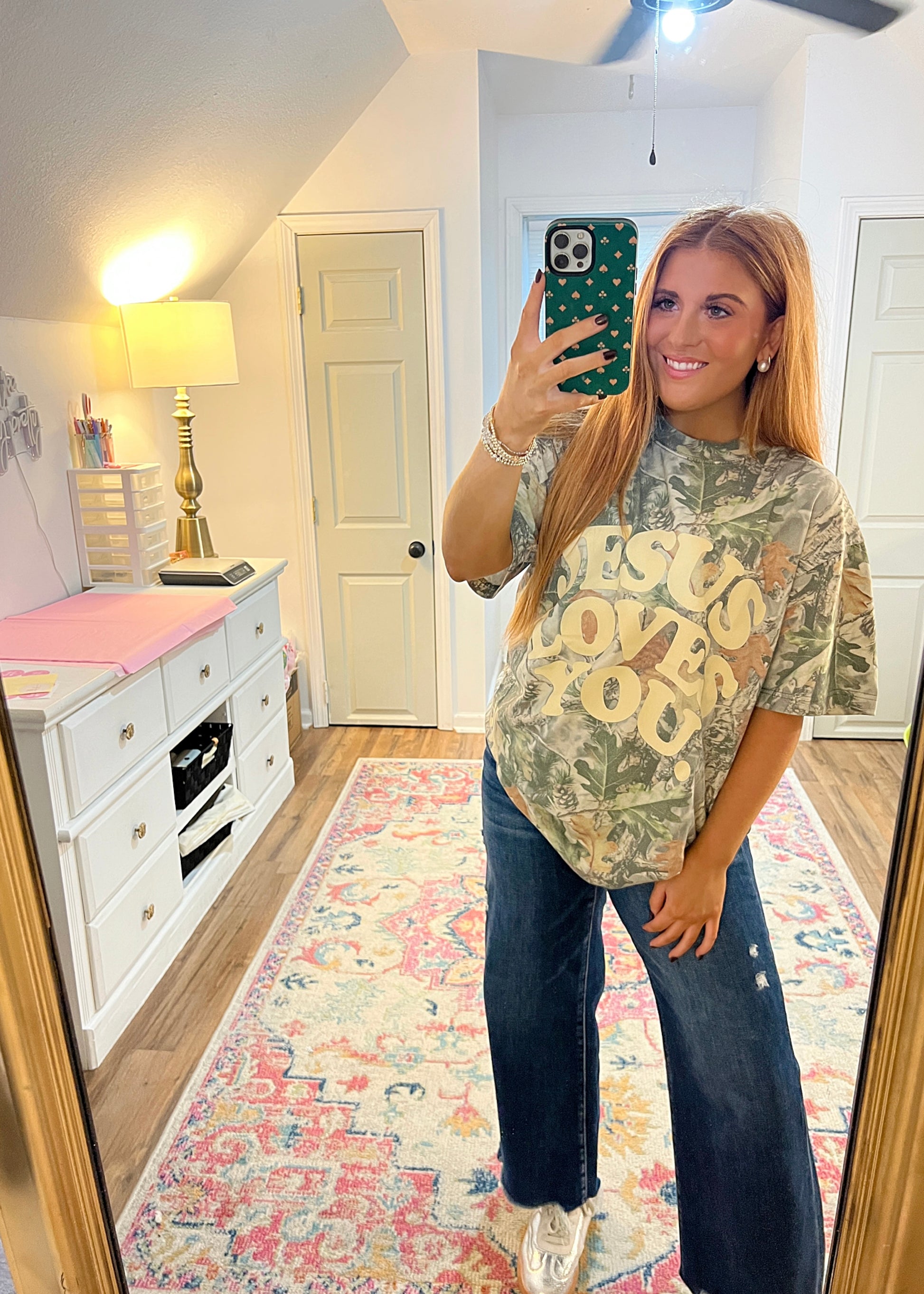 Camo short sleeve tee featuring Jesus Loves You graphic