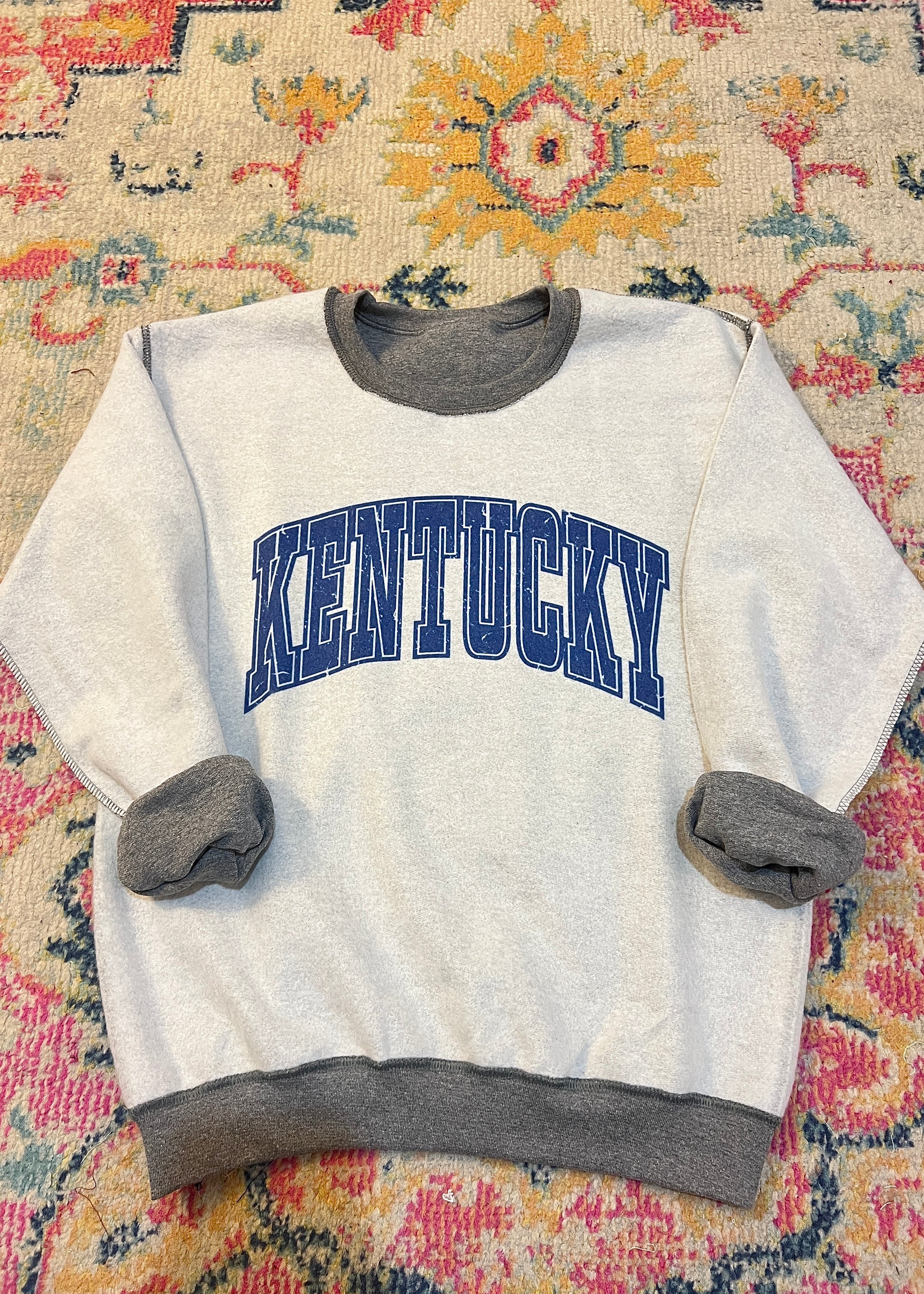Reverse distressed Kentucky sweatshirt with graphic design