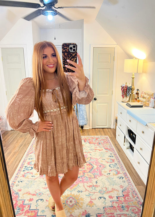 blush colored long sleeved dress with front tie 