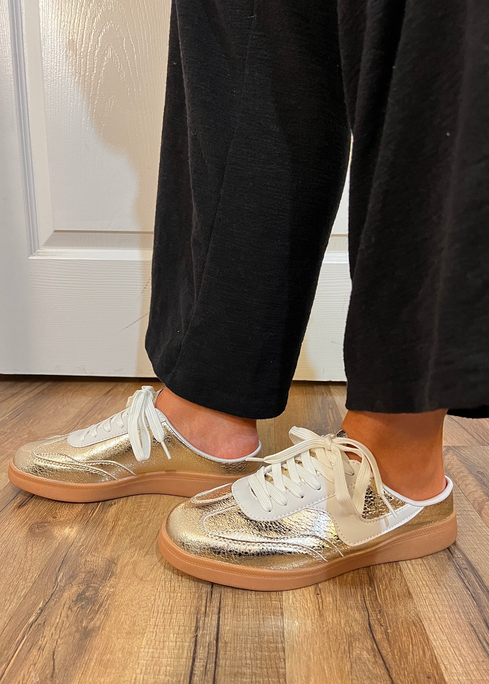 Gold slip-on sneaker with textured detailing