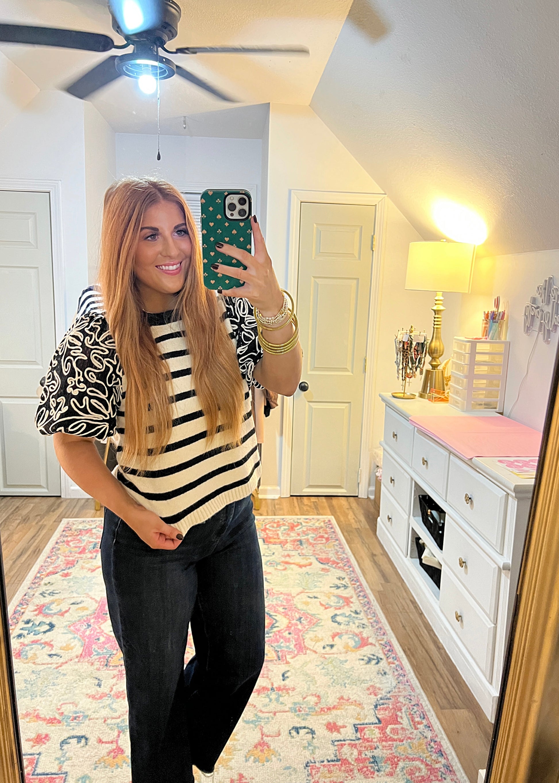 Black and cream short sleeve knit top with puff sleeves