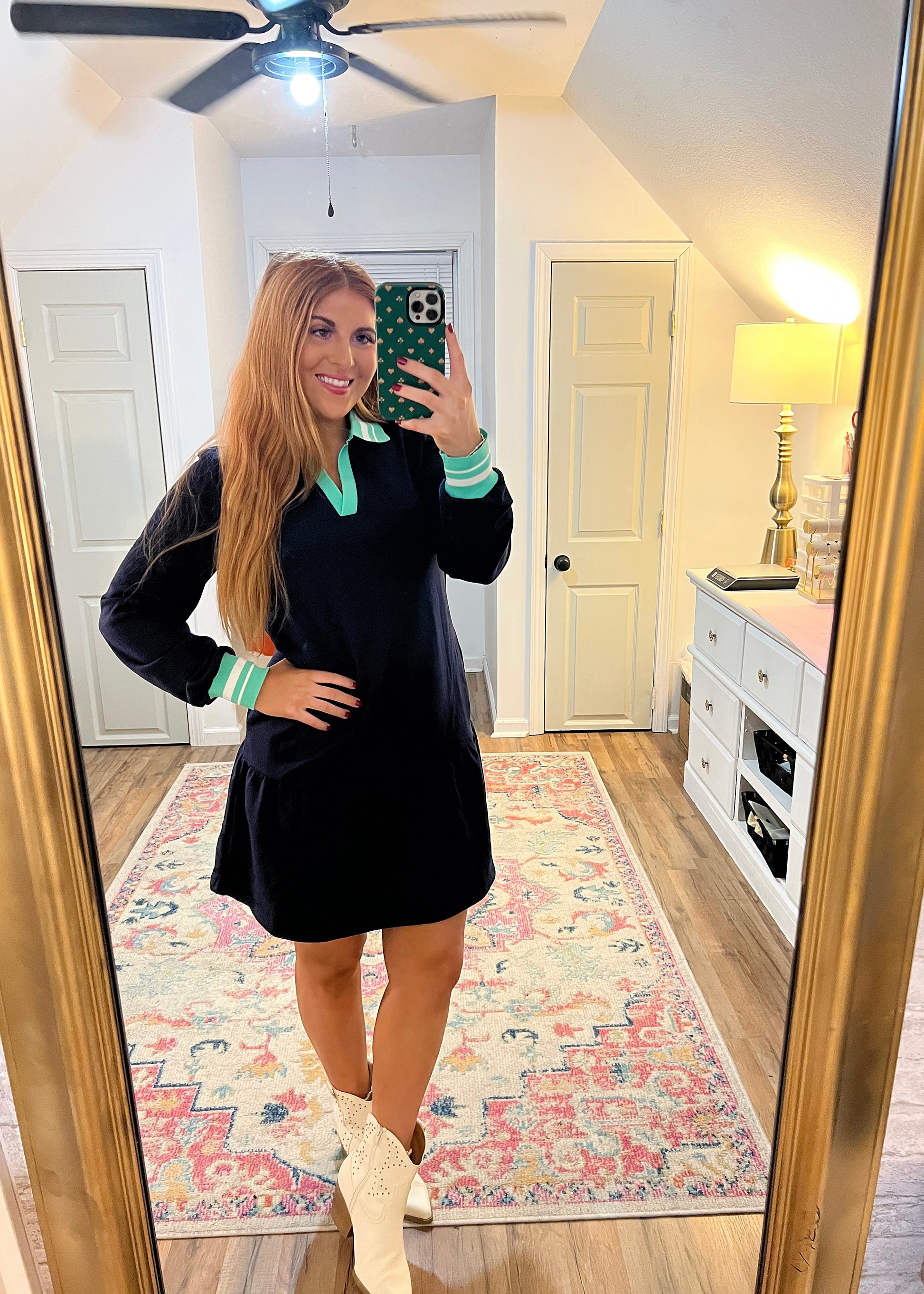 Navy ruffled dress with green and white striped collar and cuffs